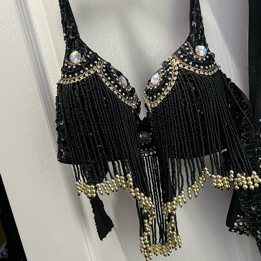 Hand beaded bra and skirt cover